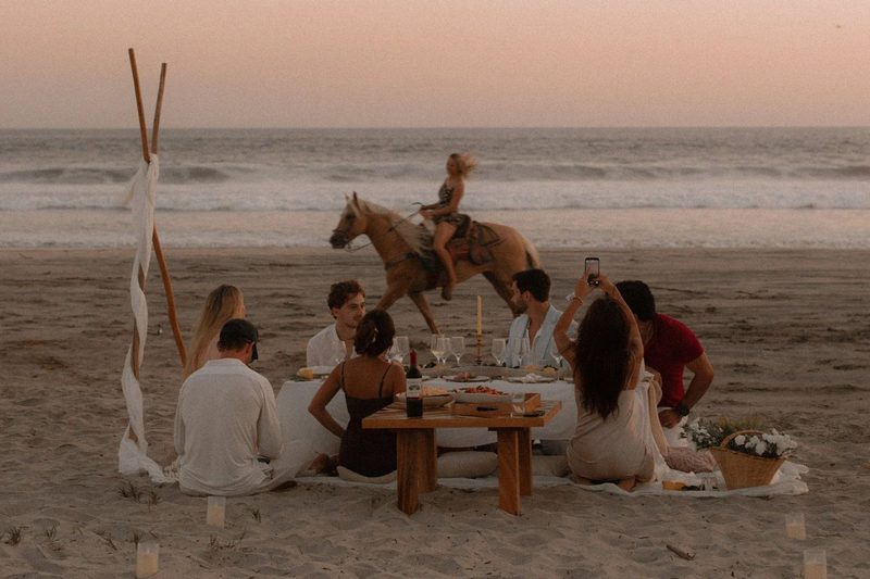 A beach dinner at sunset in Puerto Escondido