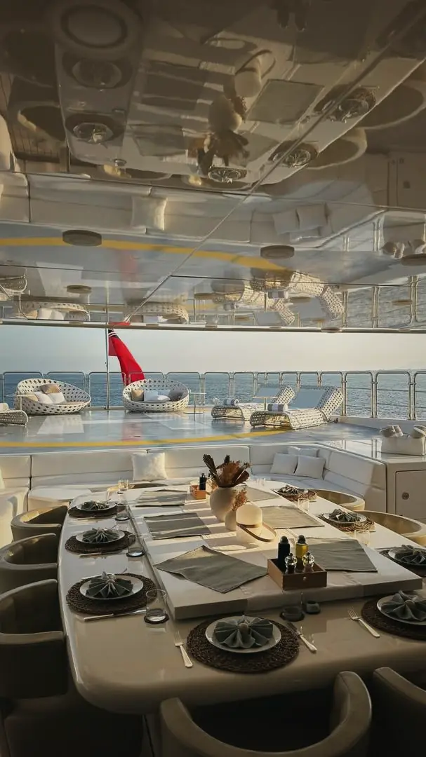 A superyacht deck set for guests