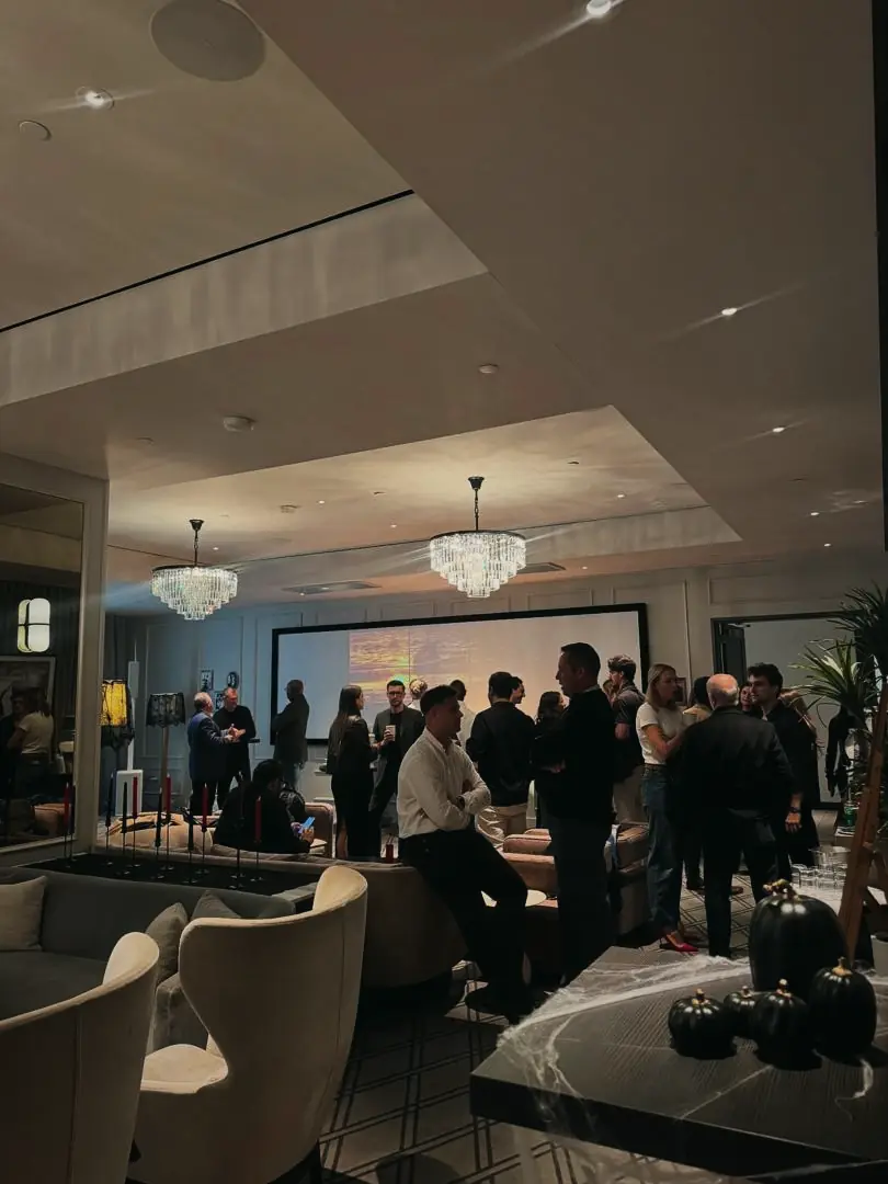 Guests in a hotel lounge at an evening event