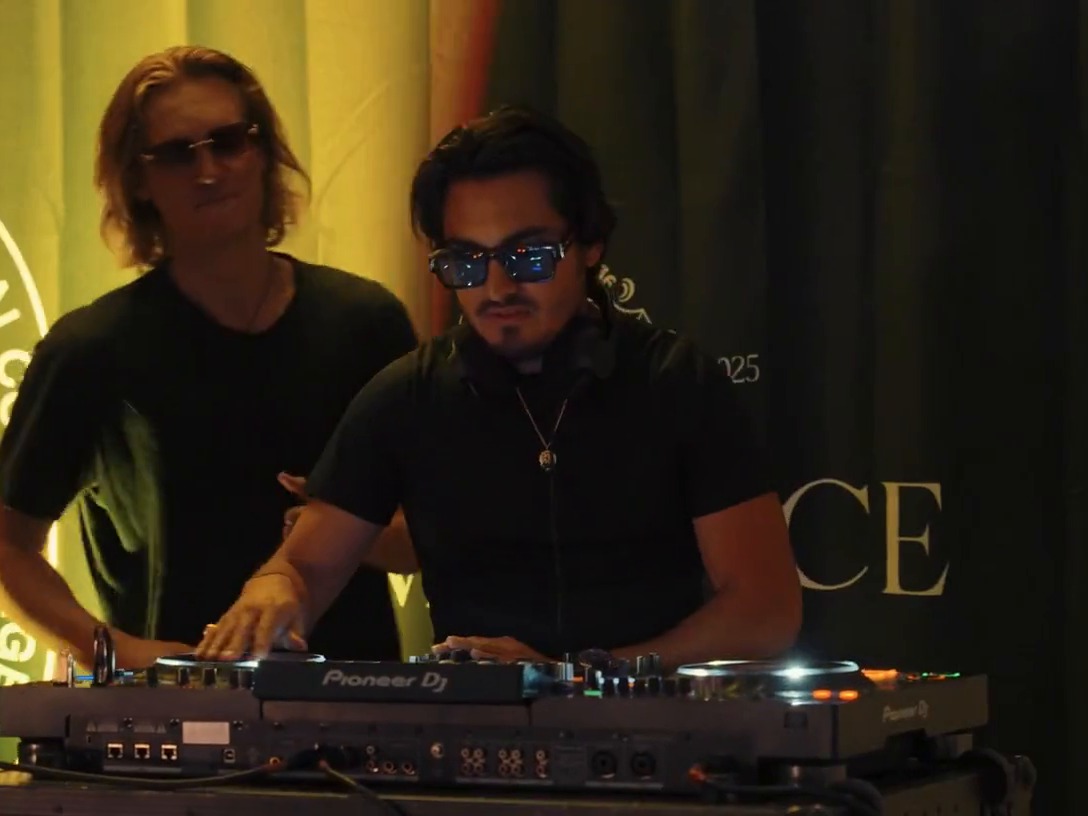 DJs on the decks under the Villion sign at the Villion launch